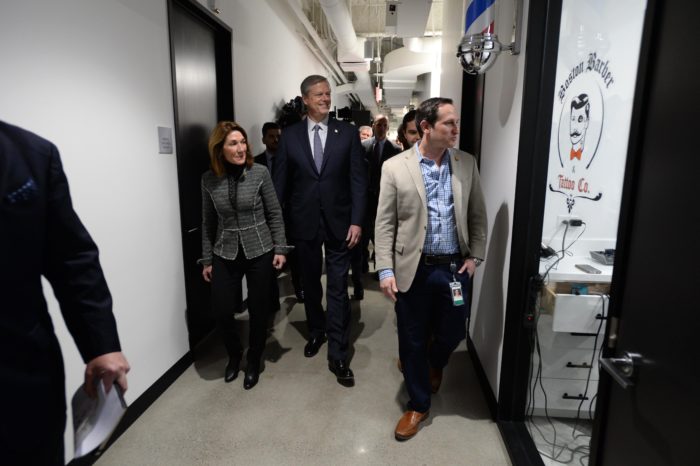 BOSTON, MA - MARCH 26: Massachusetts Governor Charlie Baker and Lt. Governor Karyn Polito receive a tour of the new Draftkings headquarters from CEO and Co-Founder Jason Robins (R) March 26, 2019 in Boston, Massachusetts. (Photo by Darren McCollester/Getty Images for DraftKings)