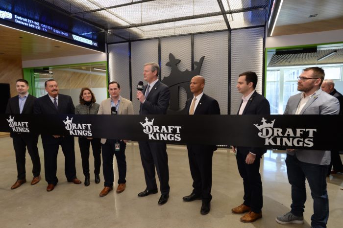 BOSTON, MA - MARCH 26: (L to R) City Councilor Josh Zakim, Ronald Mariano, Majority Leader, Lt. Governor Karyn Polito, DraftKings CEO and Co-Founder Jason Robins, Governor Charlie Baker, John Barros, Chief of Economic Development, and Co-Founders Paul Liberman and Matt Kalish prepare to cut the ribbon at the new DraftKings headquarters March 26, 2019 in Boston, Massachusetts. (Photo by Darren McCollester/Getty Images for DraftKings)