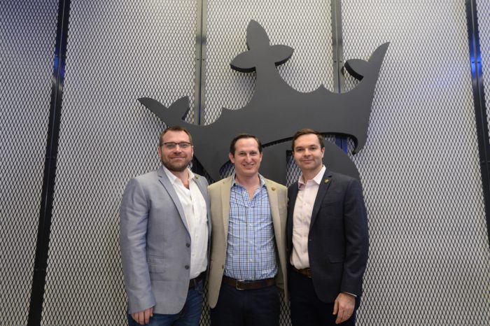 BOSTON, MA - MARCH 26: (L to R) DraftKings Co-Founder Matt Kalish, CEO and Co-Founder Jason Robins, and Co-Founder Paul Liberman at the unveiling of DraftKings headquarters March 26, 2019 in Boston, Massachusetts. (Photo by Darren McCollester/Getty Images for DraftKings)